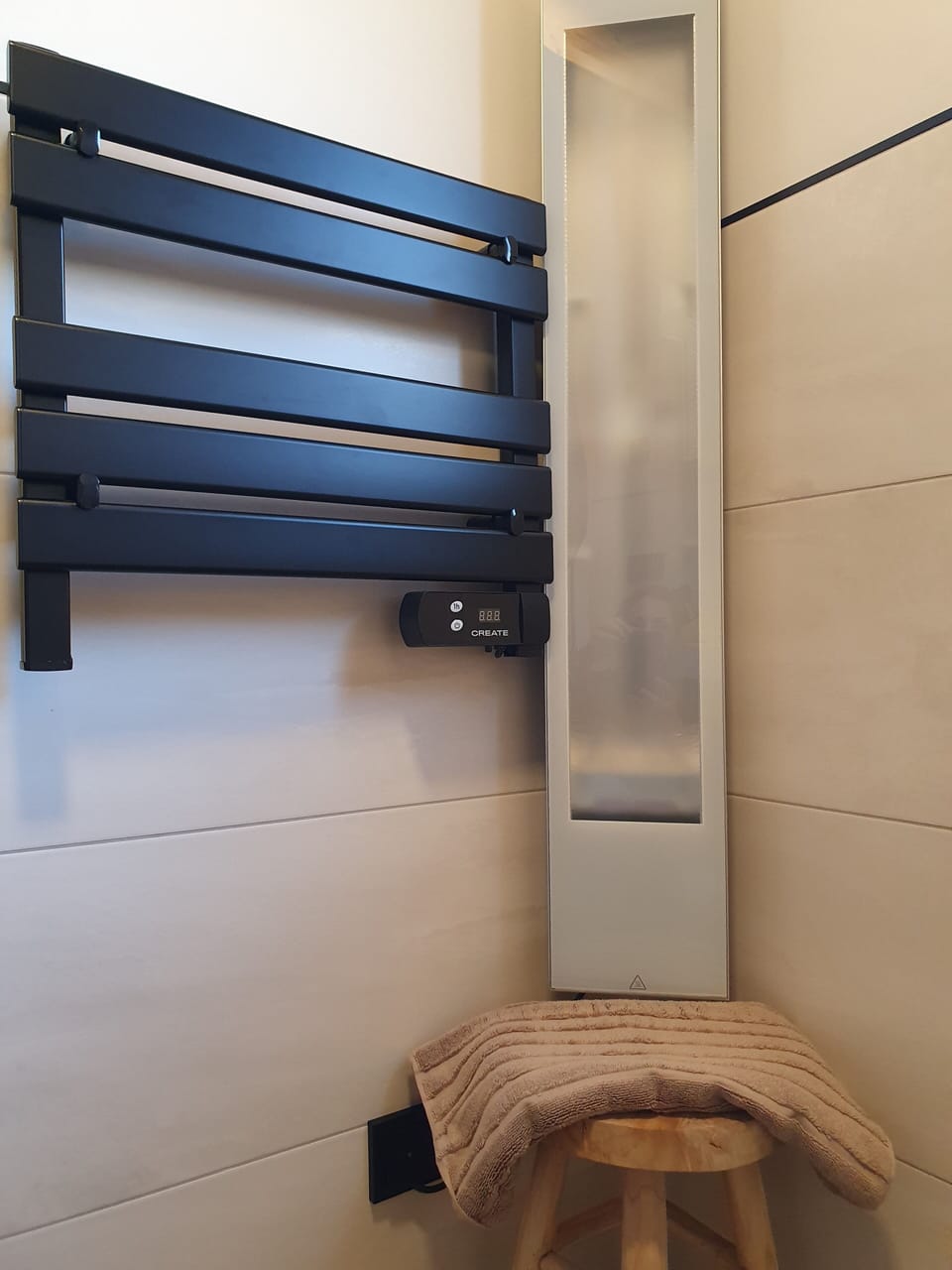 handdoekenradiator en infrarood douche