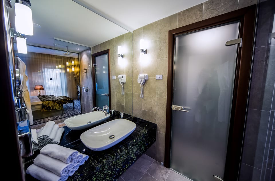 Shower, free toiletries, hair dryer, bathrobes