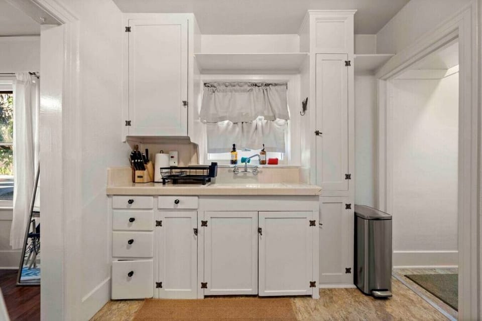 The sink and cupboard area in the kitchen.