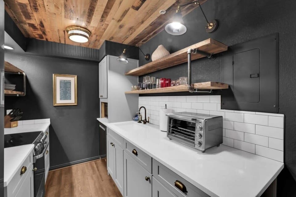 The fully equipped kitchen features a full range of appliances and all the basic cookware needed to whip up a delicious meal.