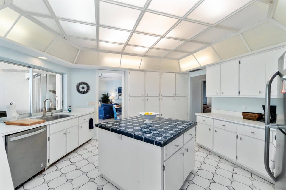 The kitchen offers ample storage space for any length of stay.
