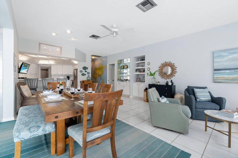 The dining area and seating area are located just off the kitchen as well.