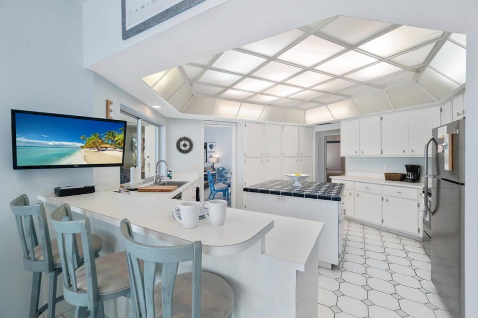 Gather 'round the fully-equipped and spacious kitchen at mealtime.