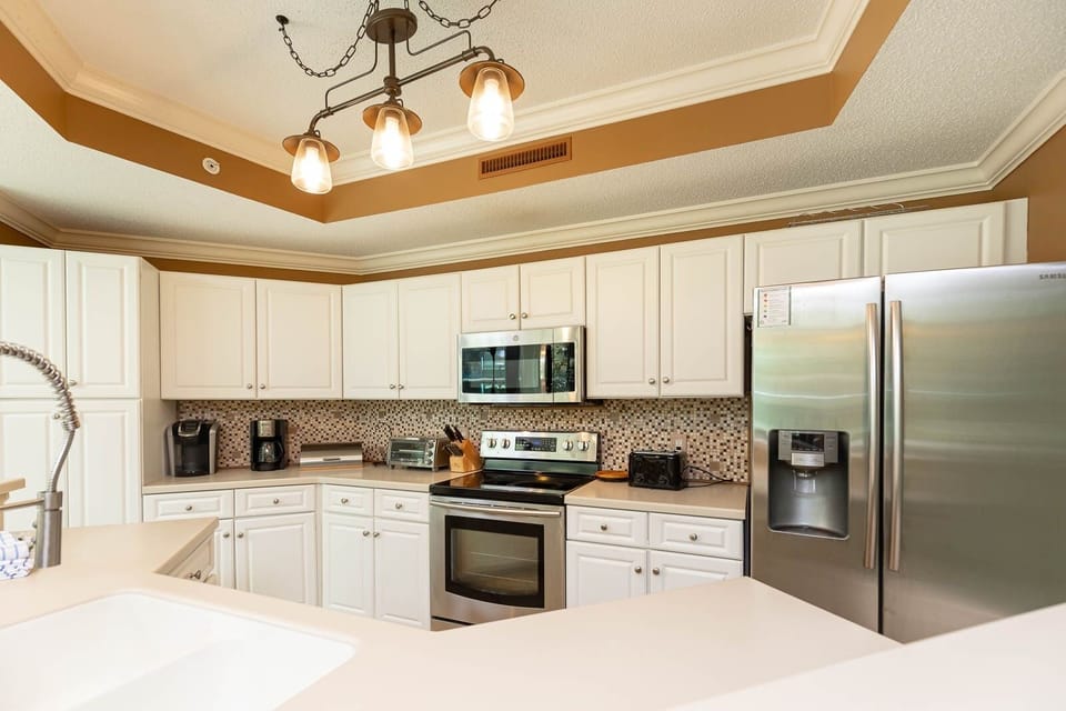 Condo, 2 Bedrooms | Private kitchen | Coffee/tea maker, fridge, oven