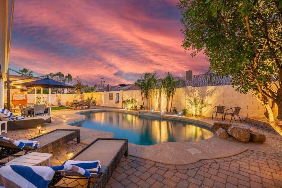 Private heated pool with fire pit and outdoor dining