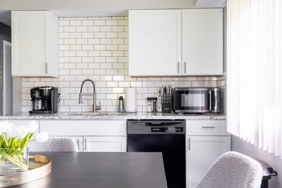 Prepare your favorite meals in this tidy and pristine kitchen