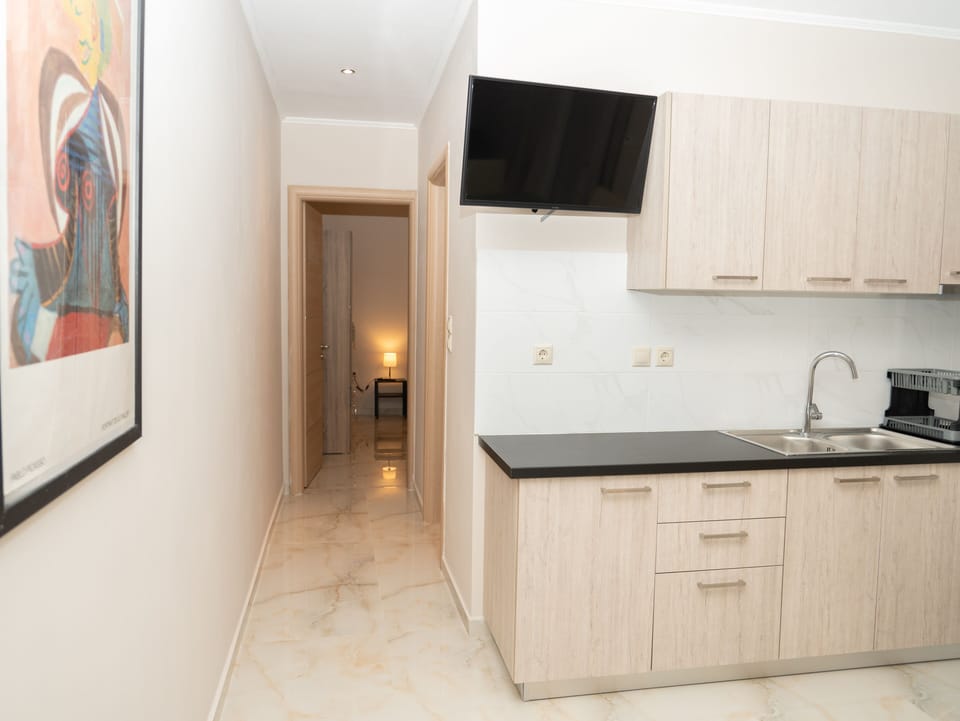 Family Apartment | Living area | 40-inch Smart TV with digital channels, TV