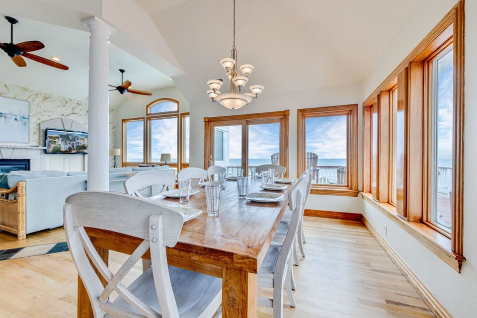 Relive the day's sunny memories over a delicious dinner at the 10-person dining table.