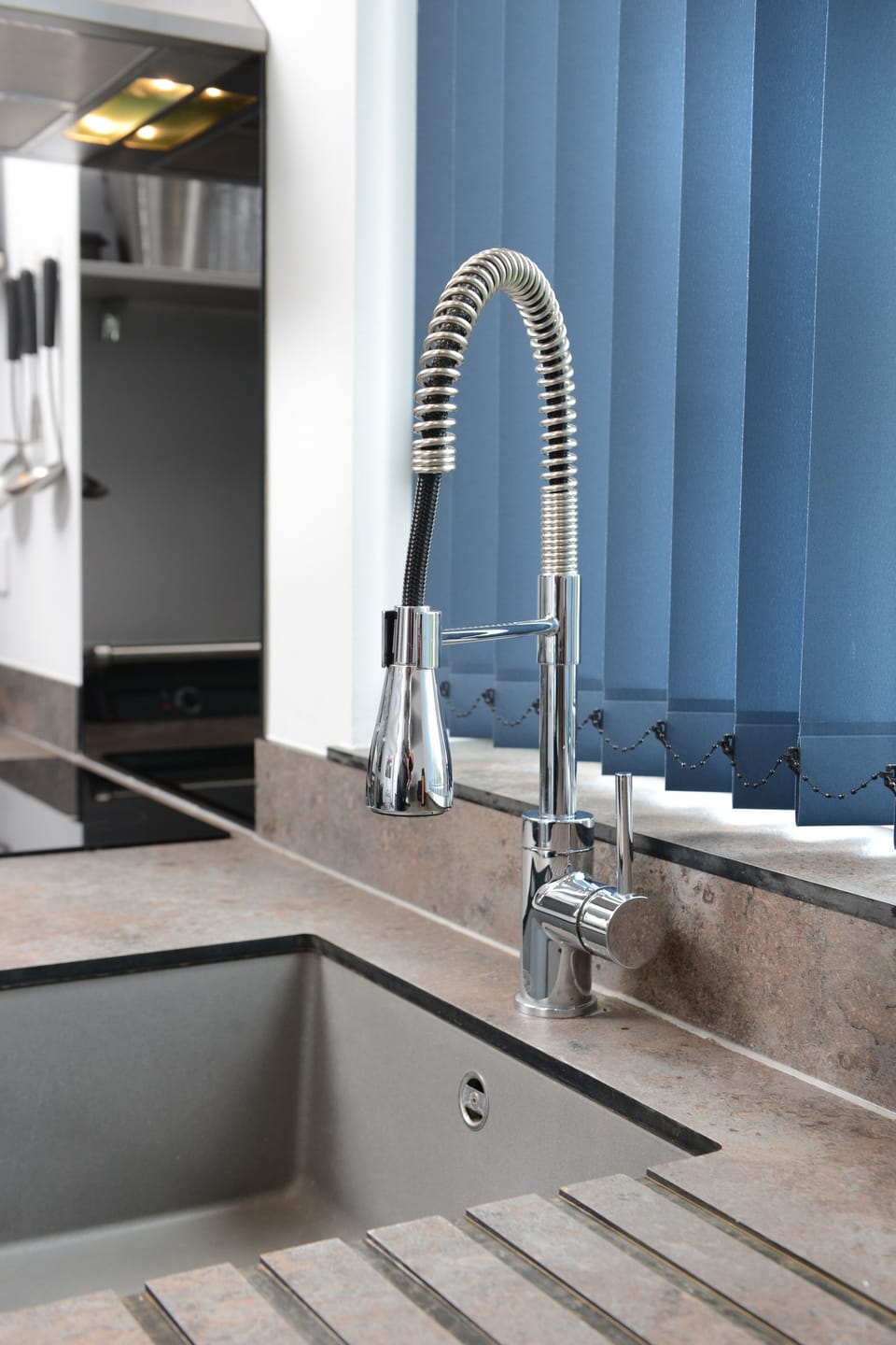 Upgrade your kitchen experience with our modern and adjustable faucet!