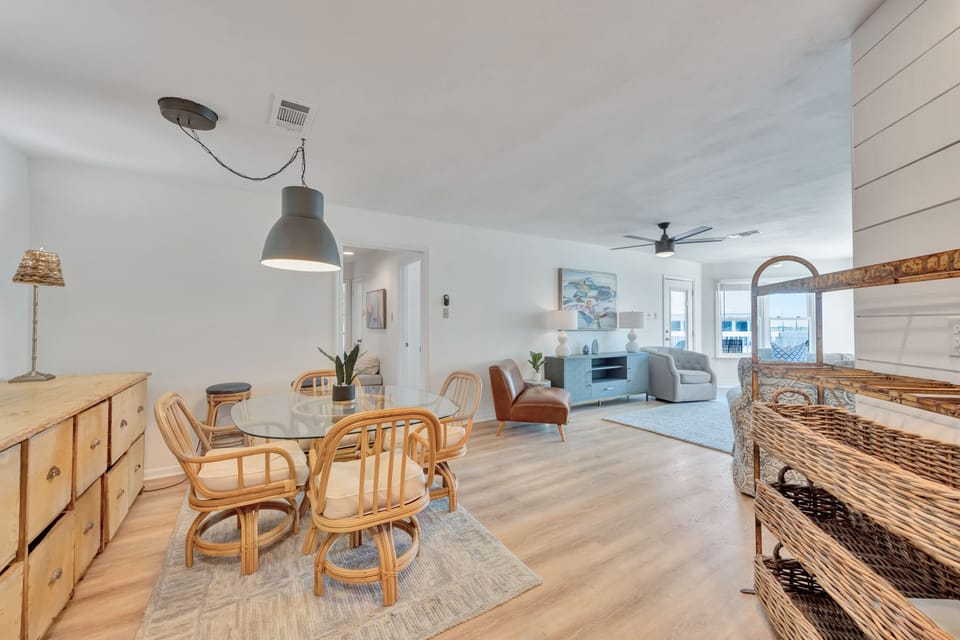Your bright, coastal-inspired living space flows seamlessly from dining to lounge, perfect for gathering with loved ones in comfort and style.