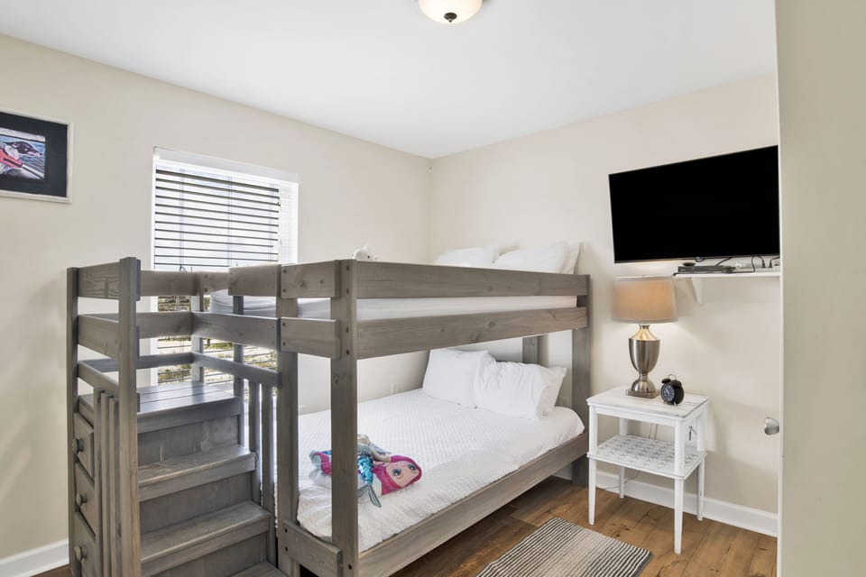 Bedroom 4 has a TV and Full over Full bunk bed - sleeps 4