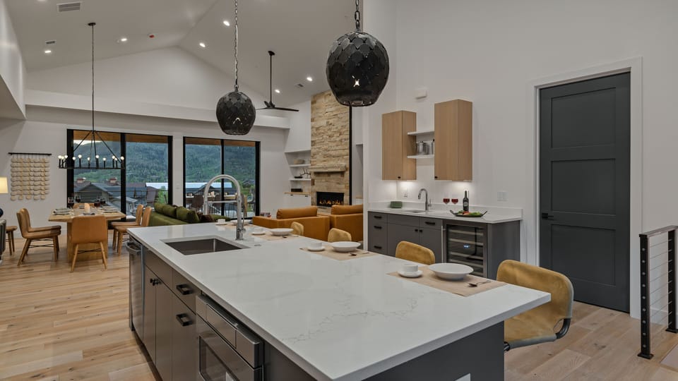 Kitchen, Main Level - Island with seating and pendant lighting