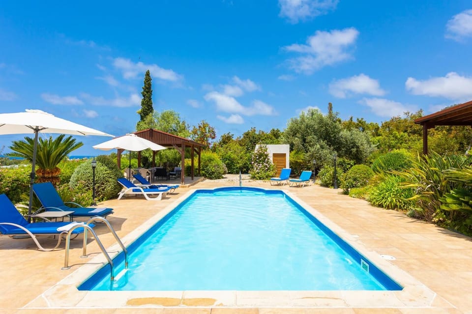 Private pool, terrace, and garden with sea views