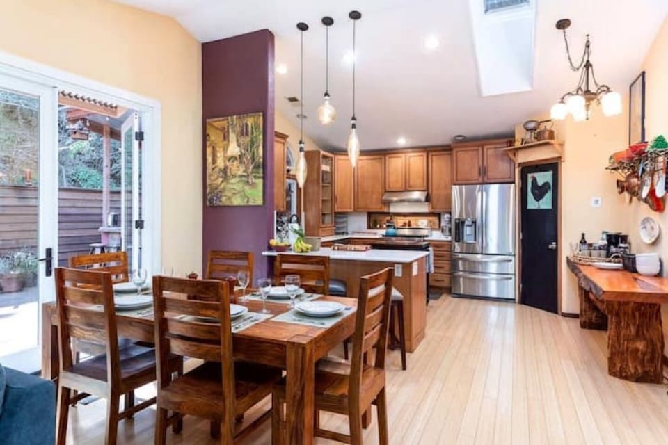 Large double doors go out to expansive back deck.