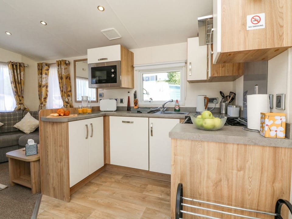 Fridge, dishwasher, electric kettle, cookware/dishes/utensils