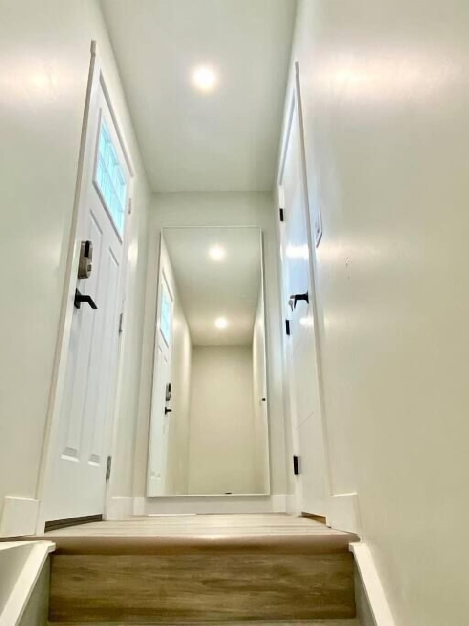 Secondary suite entrance to downstairs 