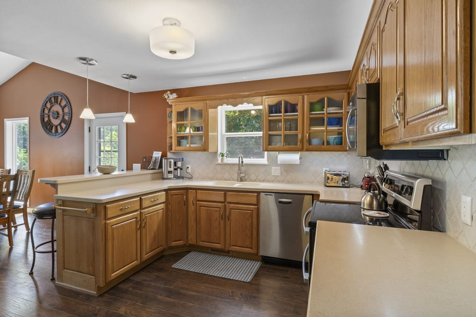 Island bar makes meal preparation more convenient.