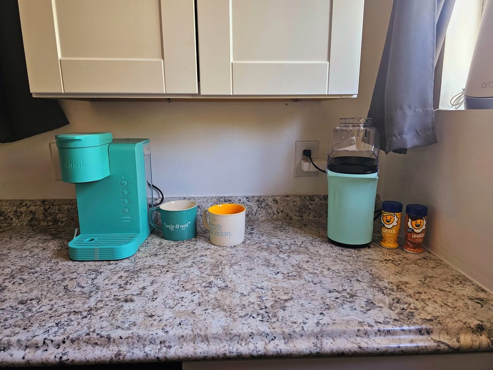 We have a popcorn station with sweet and salty flavors. There is also a Keurig.