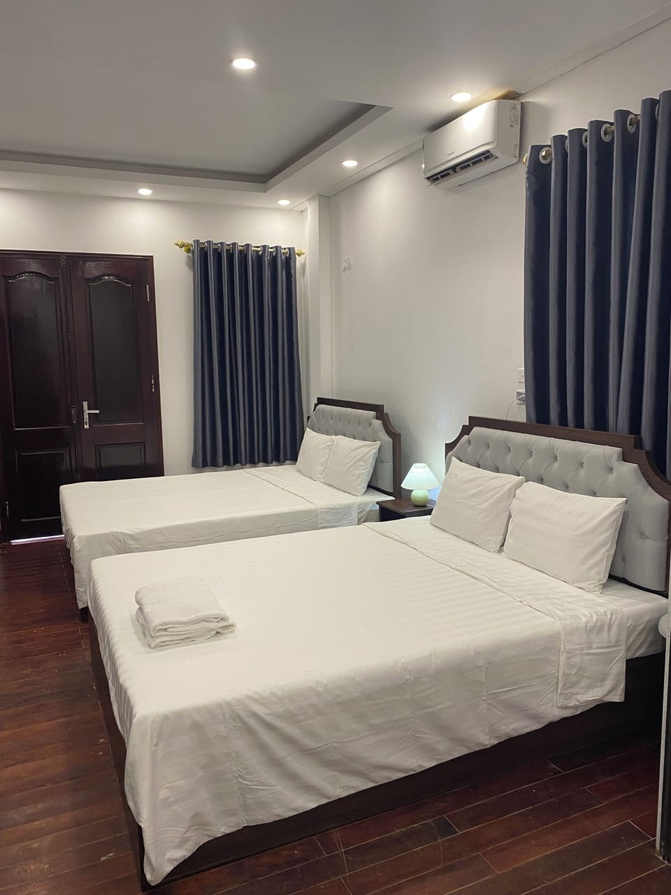 Family Room, 2 Queen Beds | Iron/ironing board, free WiFi