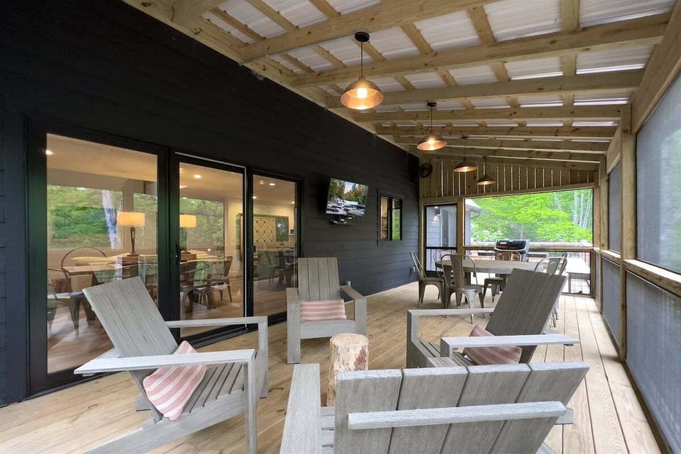 Screened in Porch with Seating, Dining, and Gas Grill