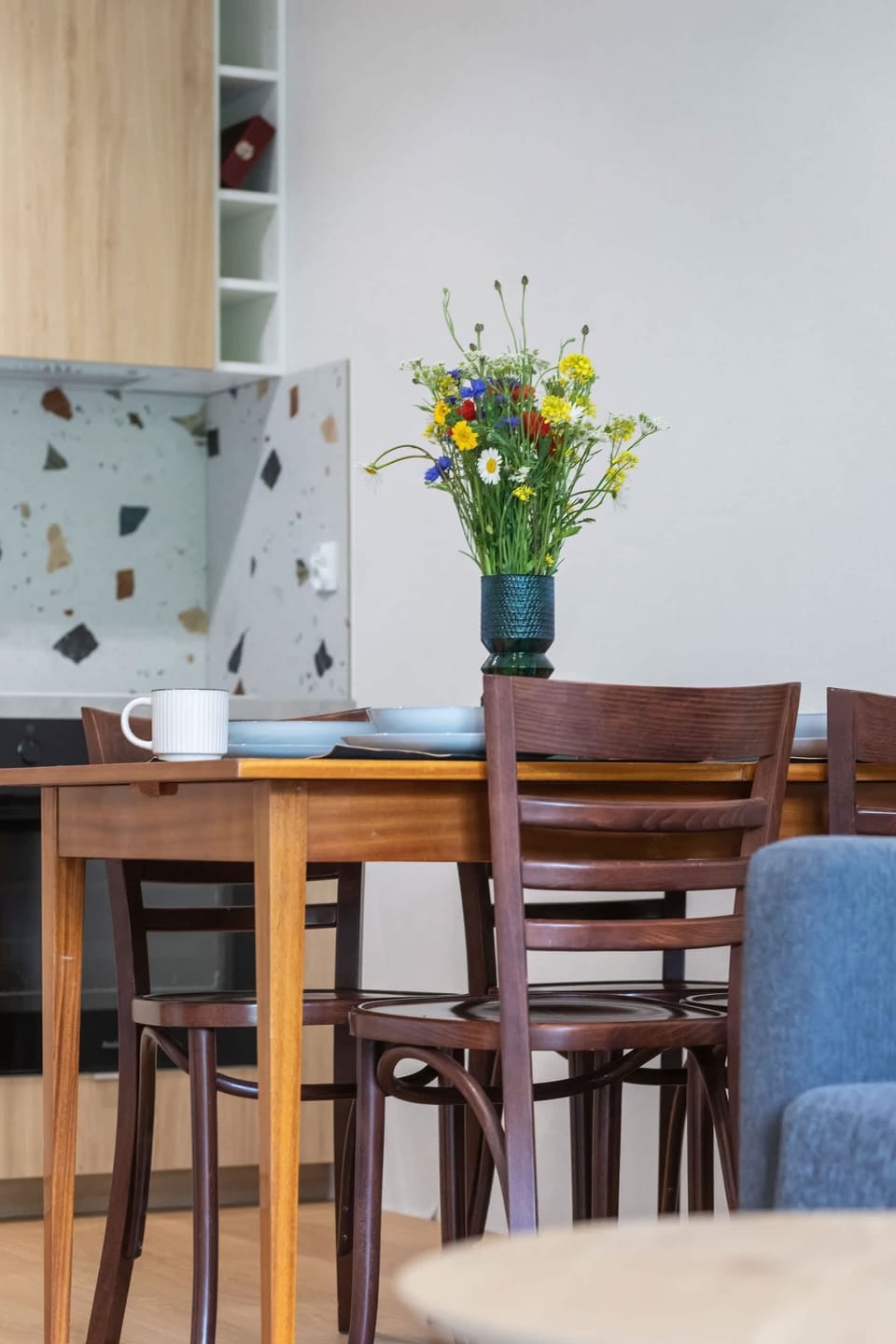 Dining table with tableware.