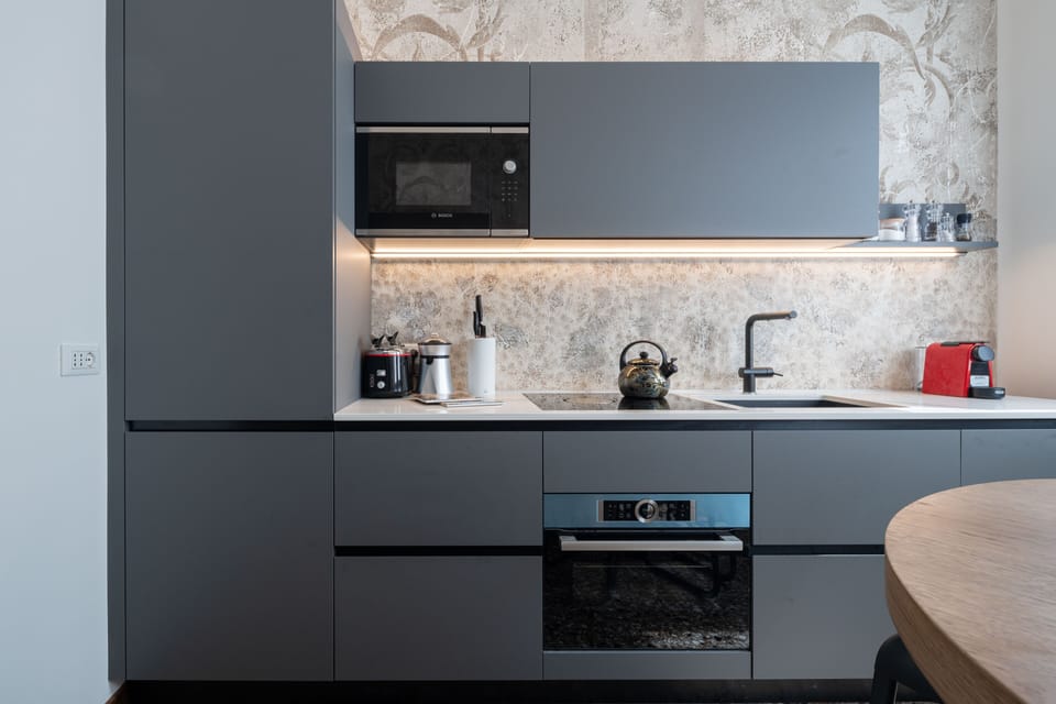 Luxury Apartment | Private kitchen | Full-size fridge, microwave, oven, stovetop