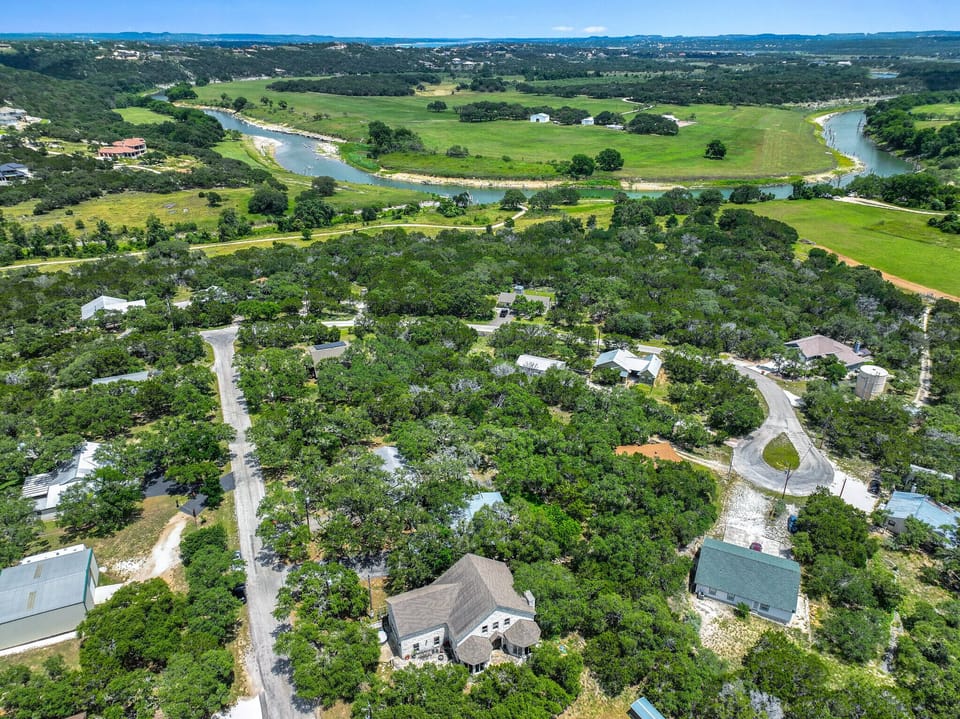 Aerial view of the neighbood showing the river in the background.