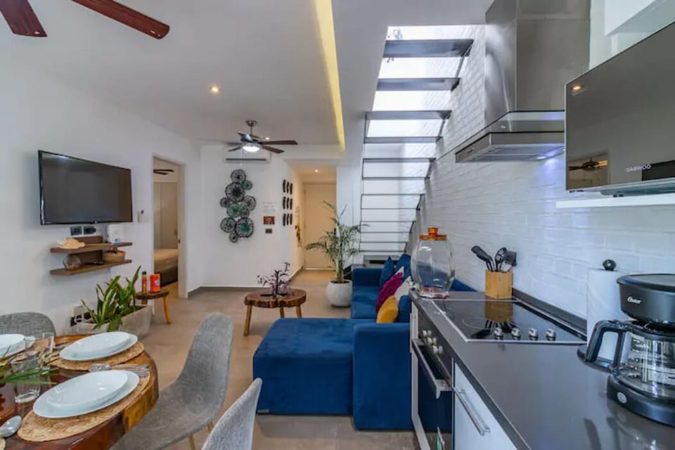 Luxury Apartment | Living area | 50-inch Smart TV with digital channels, TV, Netflix