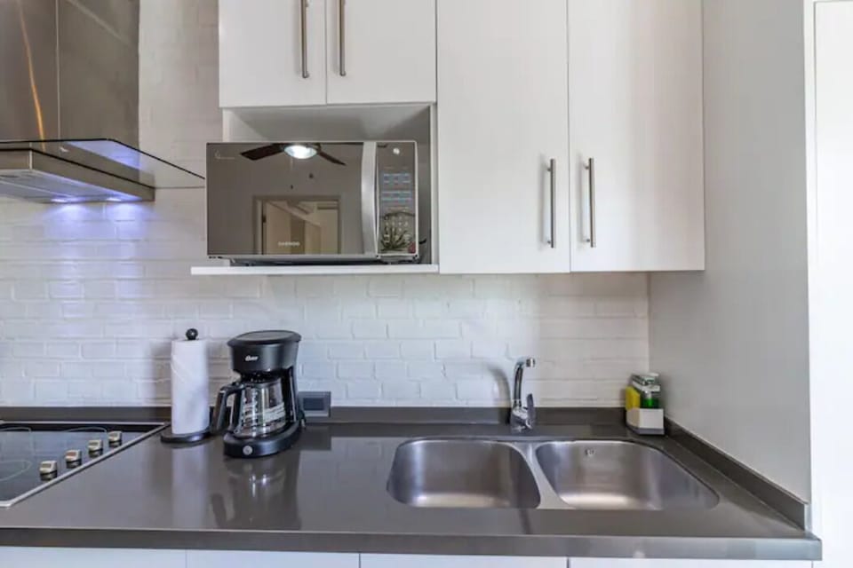 Luxury Apartment | Private kitchen | Full-size fridge, microwave, oven, coffee/tea maker
