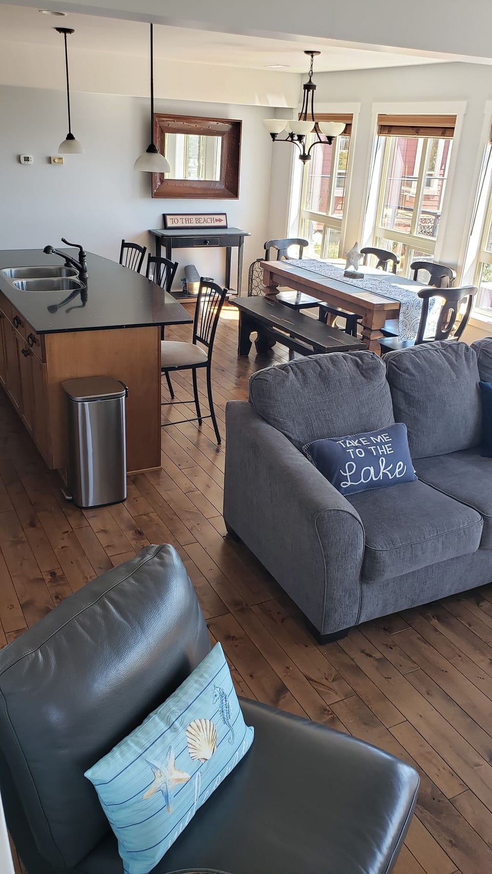 Open concept living room with breathtaking views, fire place, TV and more.