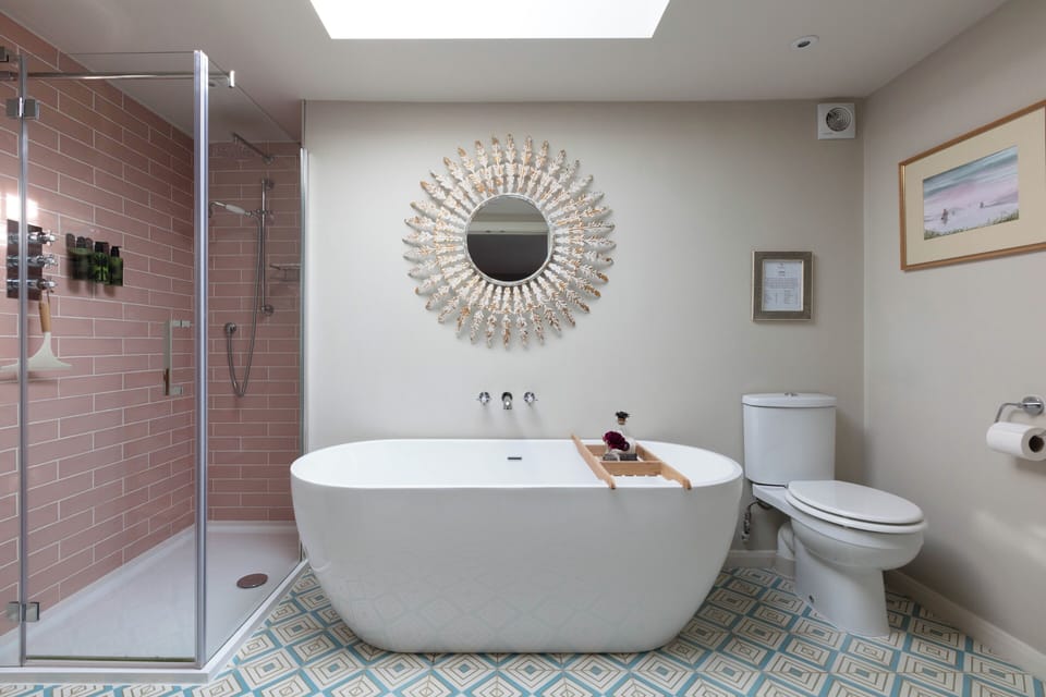 En Suite free standing bath, large shower and toilet 