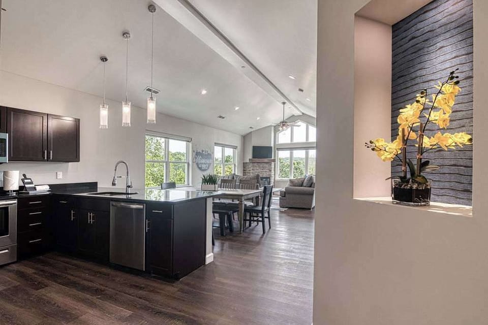 Open concept kitchen and living room means everyone can be part of the fun, whether on the couch or in the kitchen!
