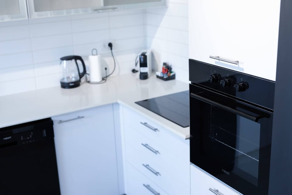 Modern appliances and clean design create a practical kitchen for effortless daily living.