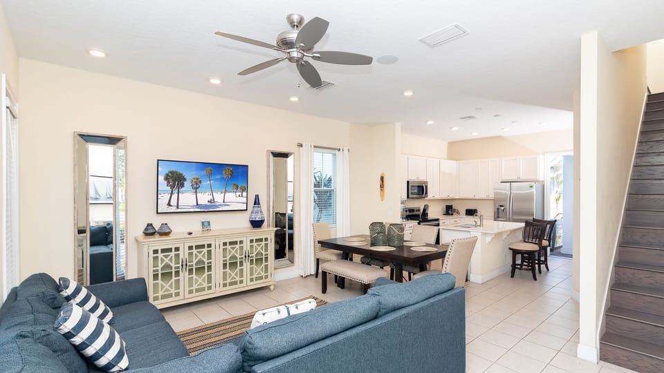 Spacious, stylish & open living area made for gathering in home base near Disney