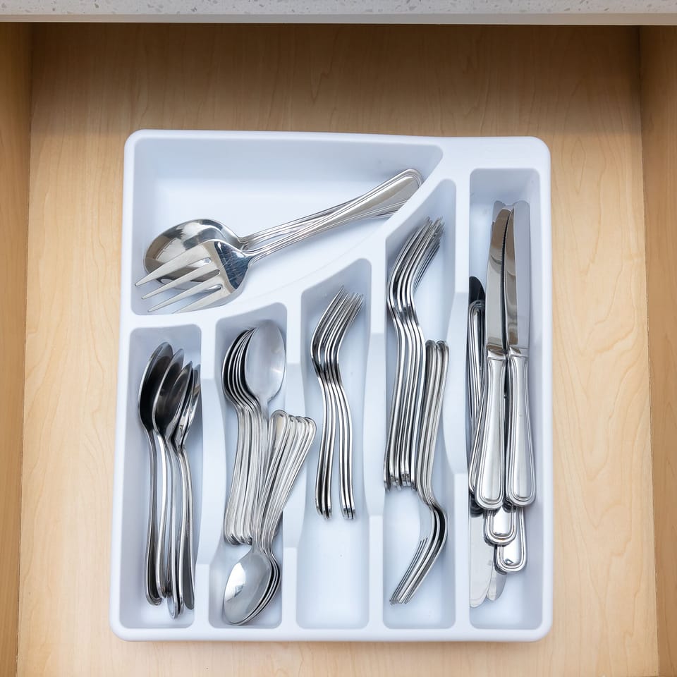 Enough flatware for 10 people.