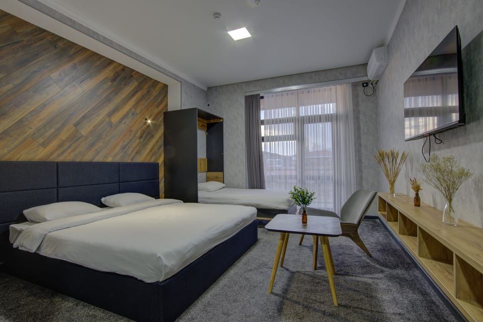 Comfort Triple Room | Minibar, desk, laptop workspace, free WiFi