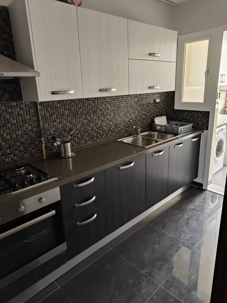 Fridge, cleaning supplies, paper towels