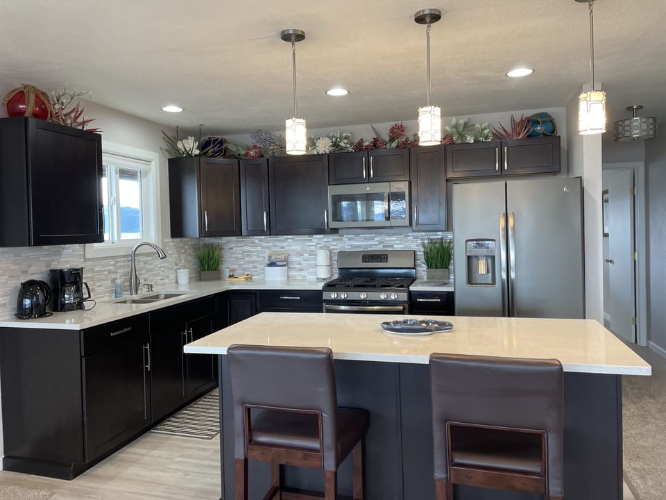 Kitchen Island area with two chairs for dining