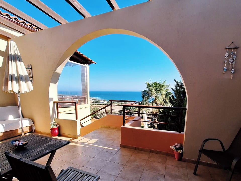 Private front terrace of the upper floor apartment with panoramic sea view
