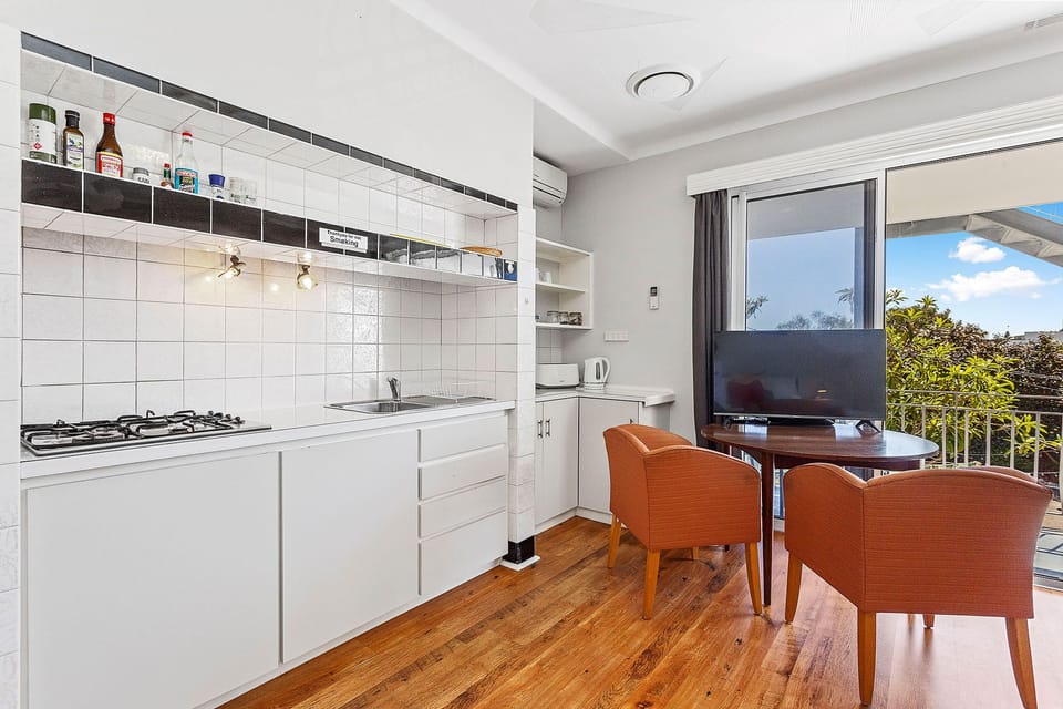 Imagine cooking a delicious meal in this well-equipped kitchen, while enjoying the scenic views through the window.