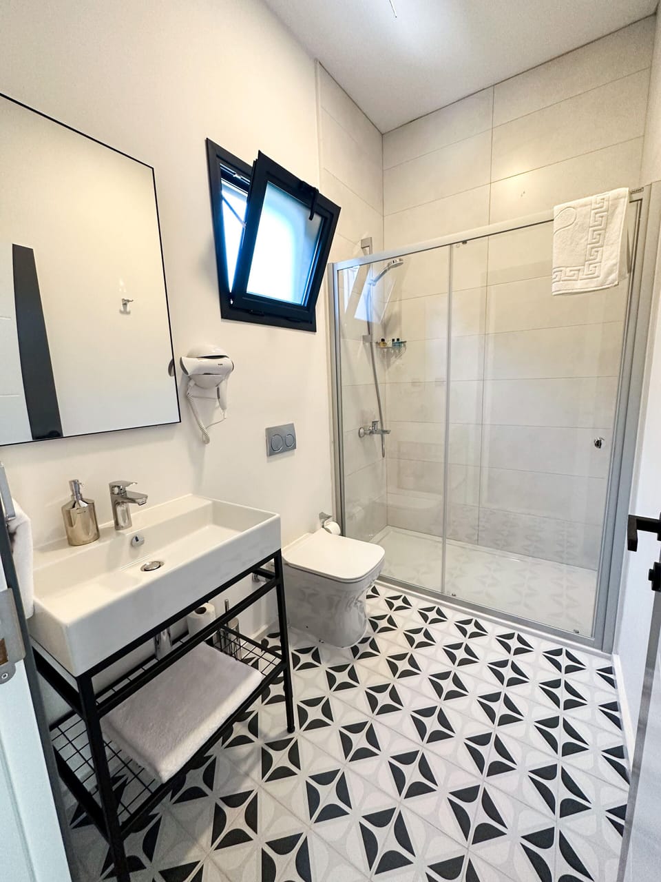 Shower, free toiletries, hair dryer, towels