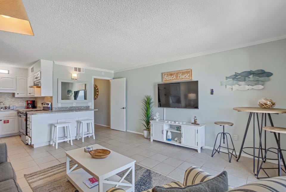 Condo, Multiple Beds, Balcony, Ocean View (Sunrise…Sunset) | Living area | 42-inch flat-screen TV with digital channels