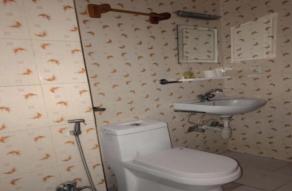 Shower, rainfall showerhead, towels, soap