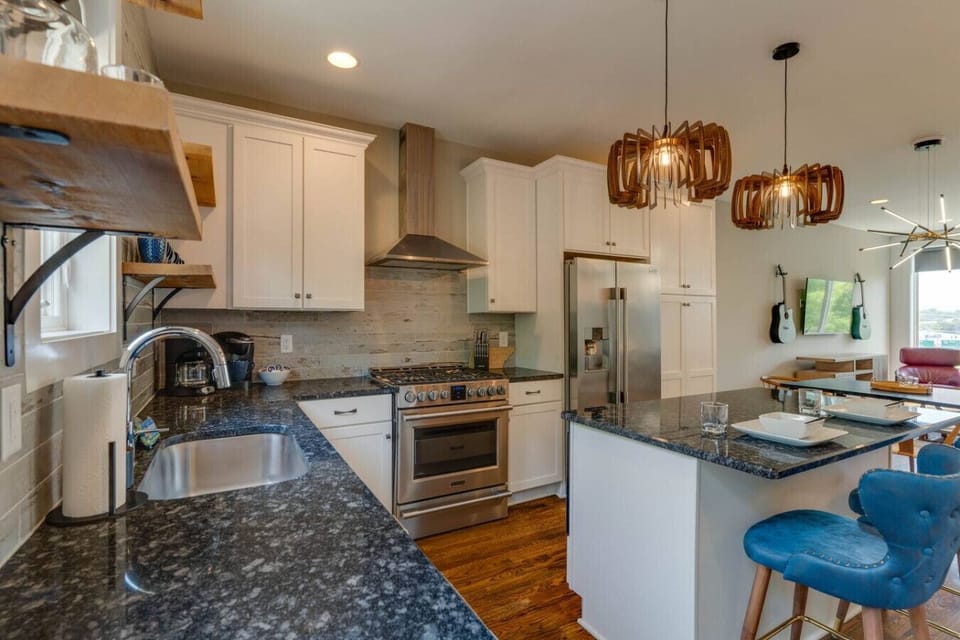 The kitchen sink, a quiet haven where dishes rest, hands wash, and the daily rhythm of the home flows