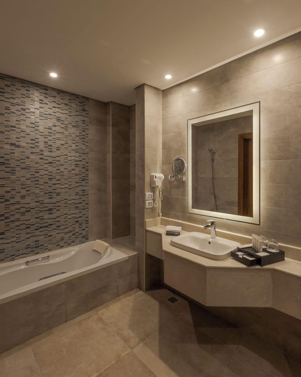 Shower, free toiletries, hair dryer, slippers