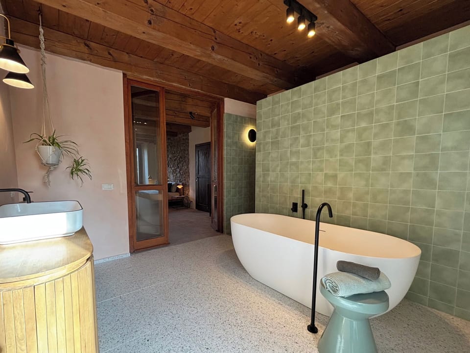 Deluxe Suite, 1 King Bed, Terrace, Vineyard View | Bathroom | Hair dryer, bidet, soap, shampoo