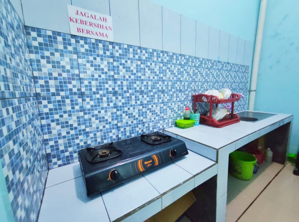 Family Triple Room, 1 Bedroom | Shared kitchen facilities | Fridge, stovetop, dishwasher, rice cooker
