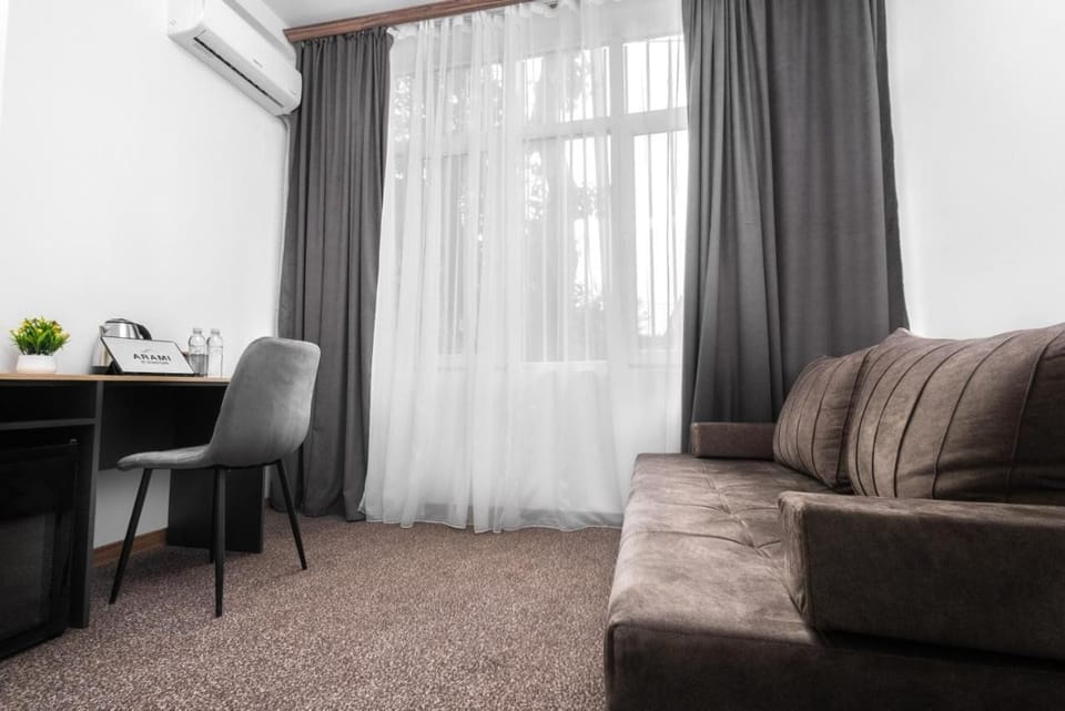 Family Room | 1 bedroom, desk, iron/ironing board, free WiFi