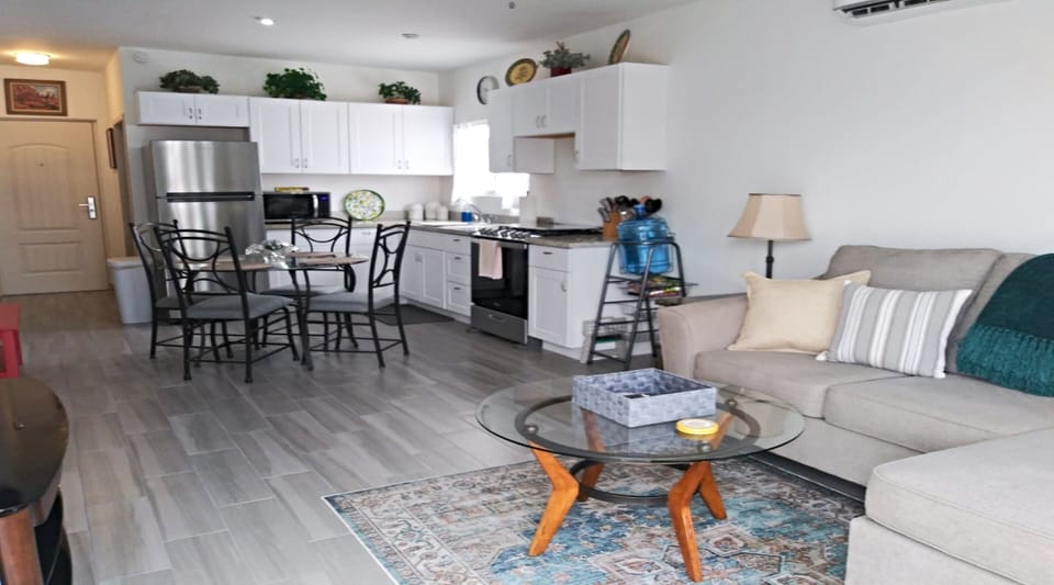 City House | Living area | 32-inch TV with cable channels