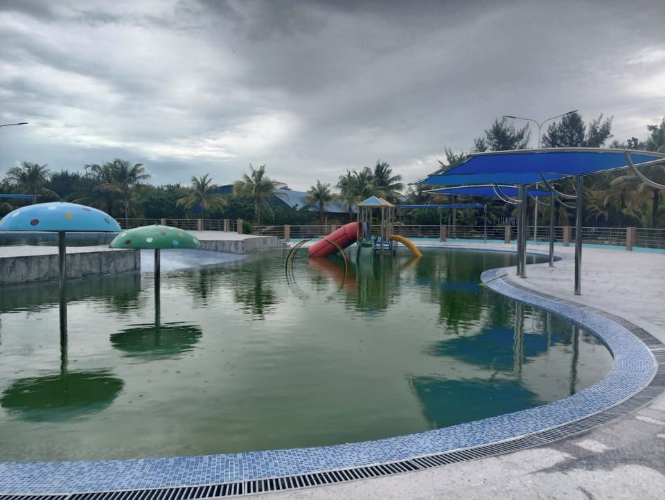 Outdoor pool, open 6:00 AM to 8:00 PM, lifeguards on site